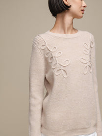 Maglione in maglia con applicazioni a foglia