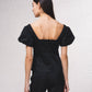 Blusa con scollo quadrato e maniche a sbuffo