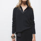 Maglione a coste con scollo a V