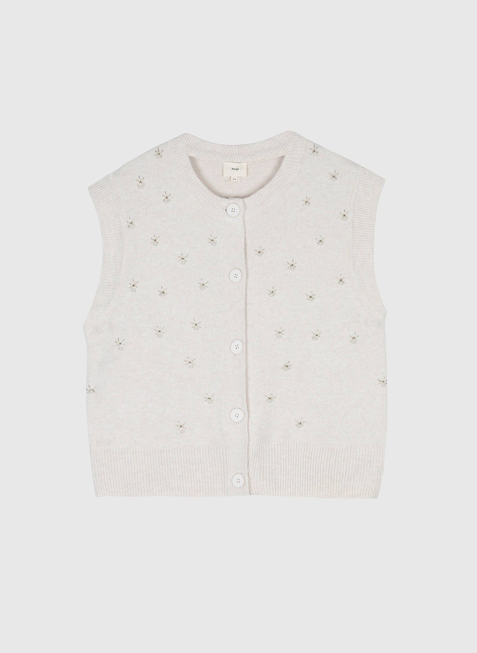 Cardigan smanicato in maglia écru con perle