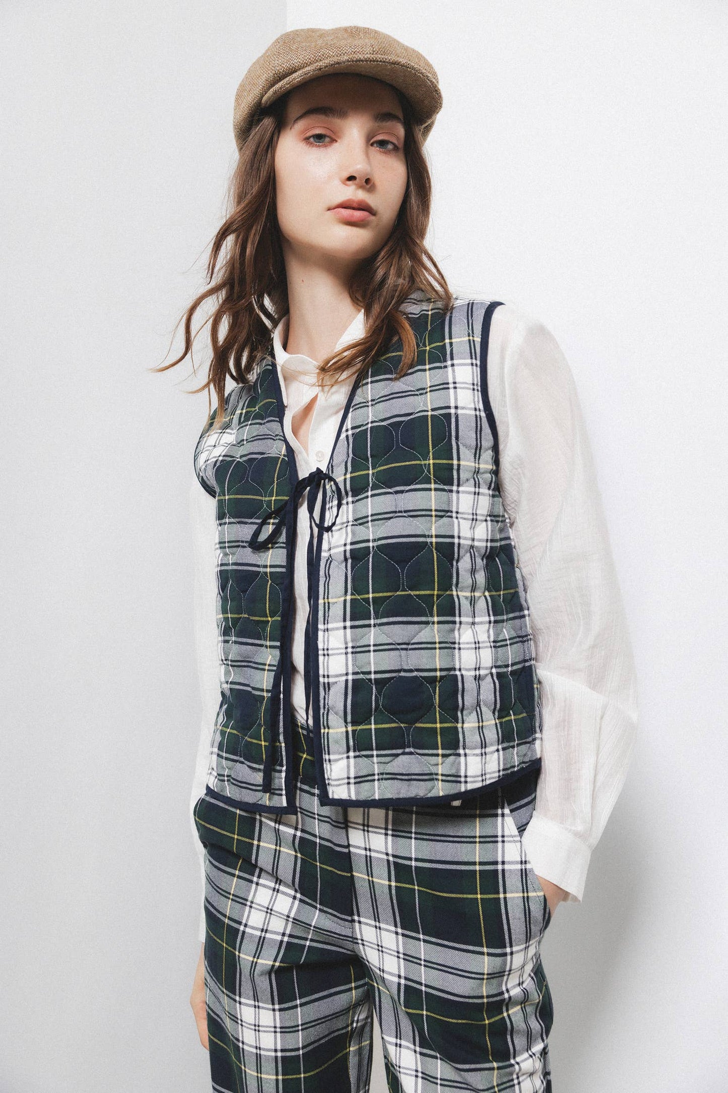 Gilet trapuntato tartan con scollo a V