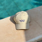 Cappellino beige con ricamo “Just Here For The Vibes”