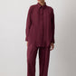 Completo con camicia a quadri e pantaloni bordeaux