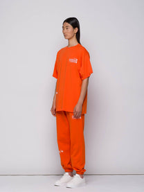 T-shirt arancione con logo