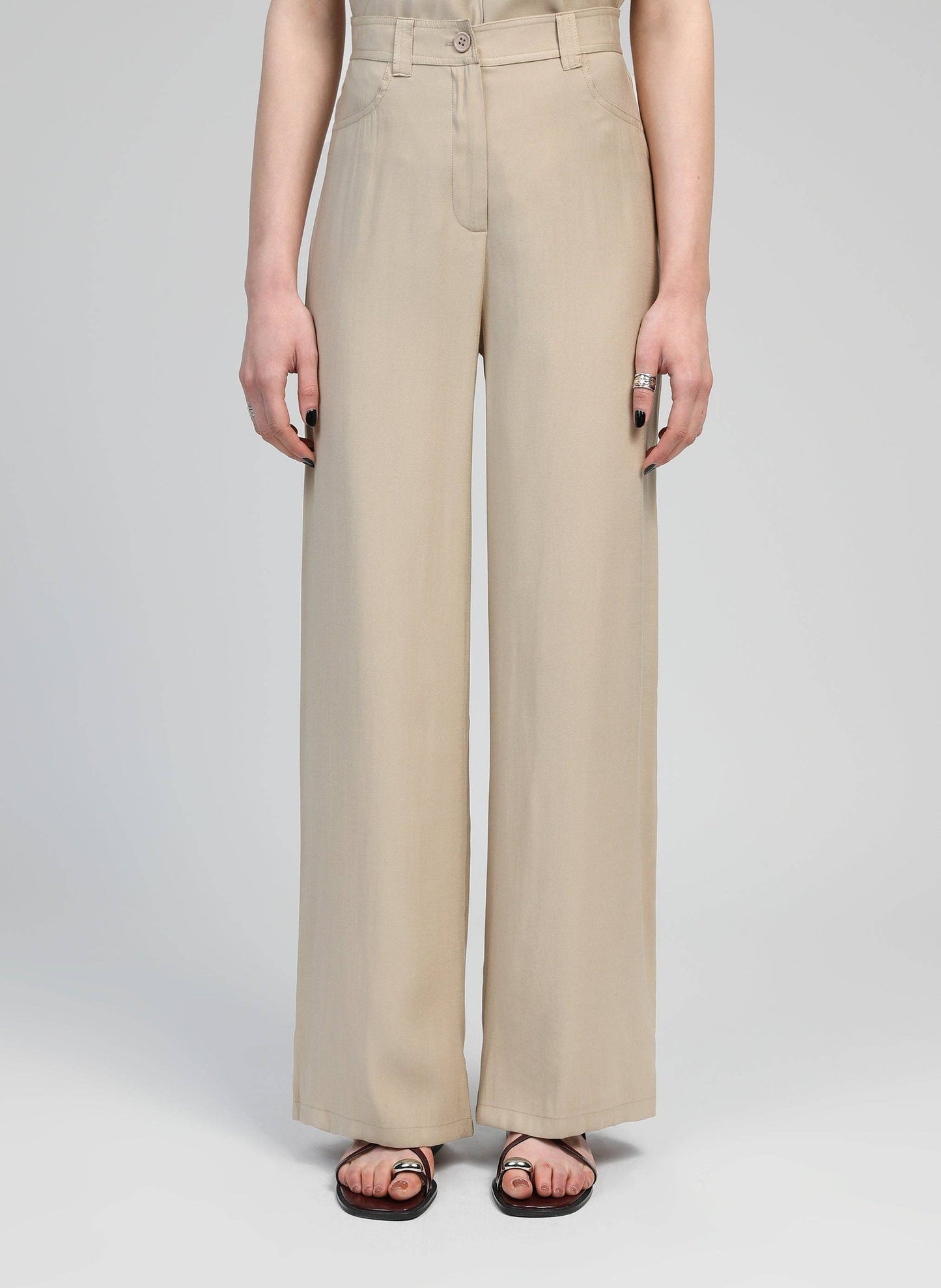 Pantaloni a zampa beige a vita alta