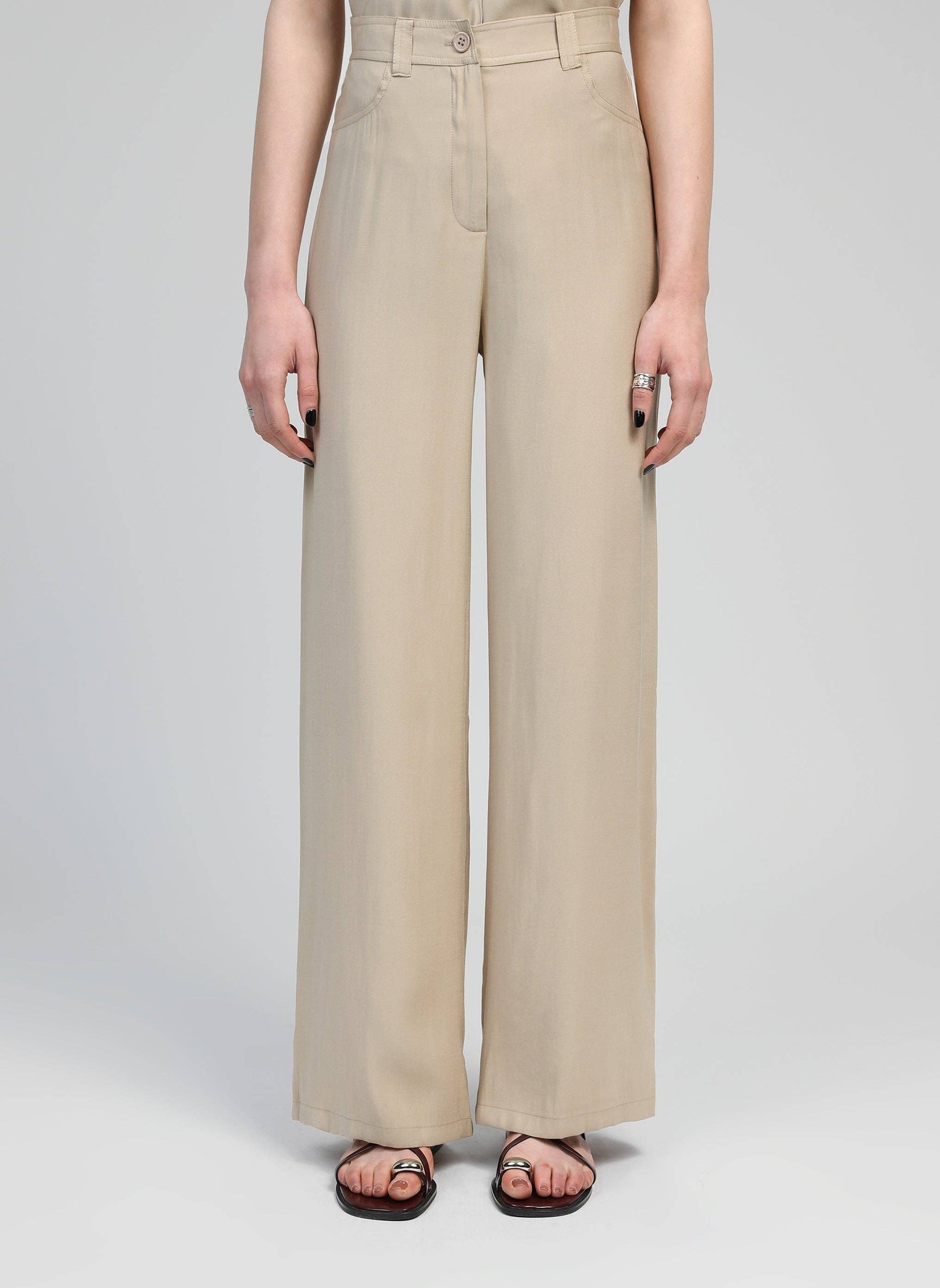 Pantaloni a zampa beige a vita alta