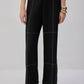 Pantaloni neri con cuciture a contrasto