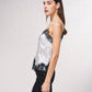 Top fluido con pizzo e scollo a V