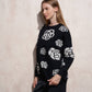 Maglione donna nero con maxi fiori a contrasto