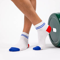Calzini sportivi bianchi a coste con righe blu