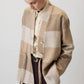 Giacca a quadri beige con cintura in vita