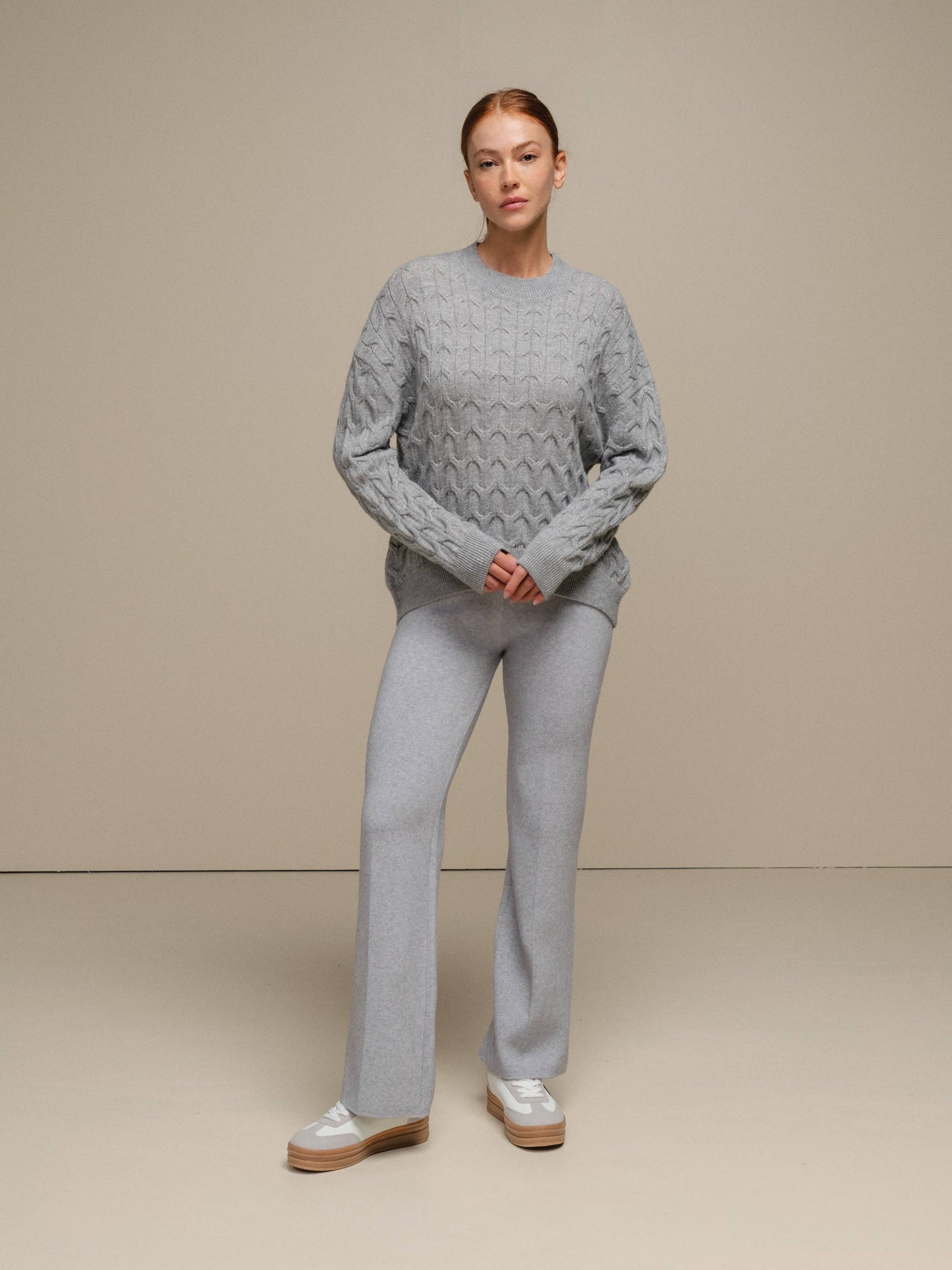 Maglione donna in maglia a trecce con filo luminoso