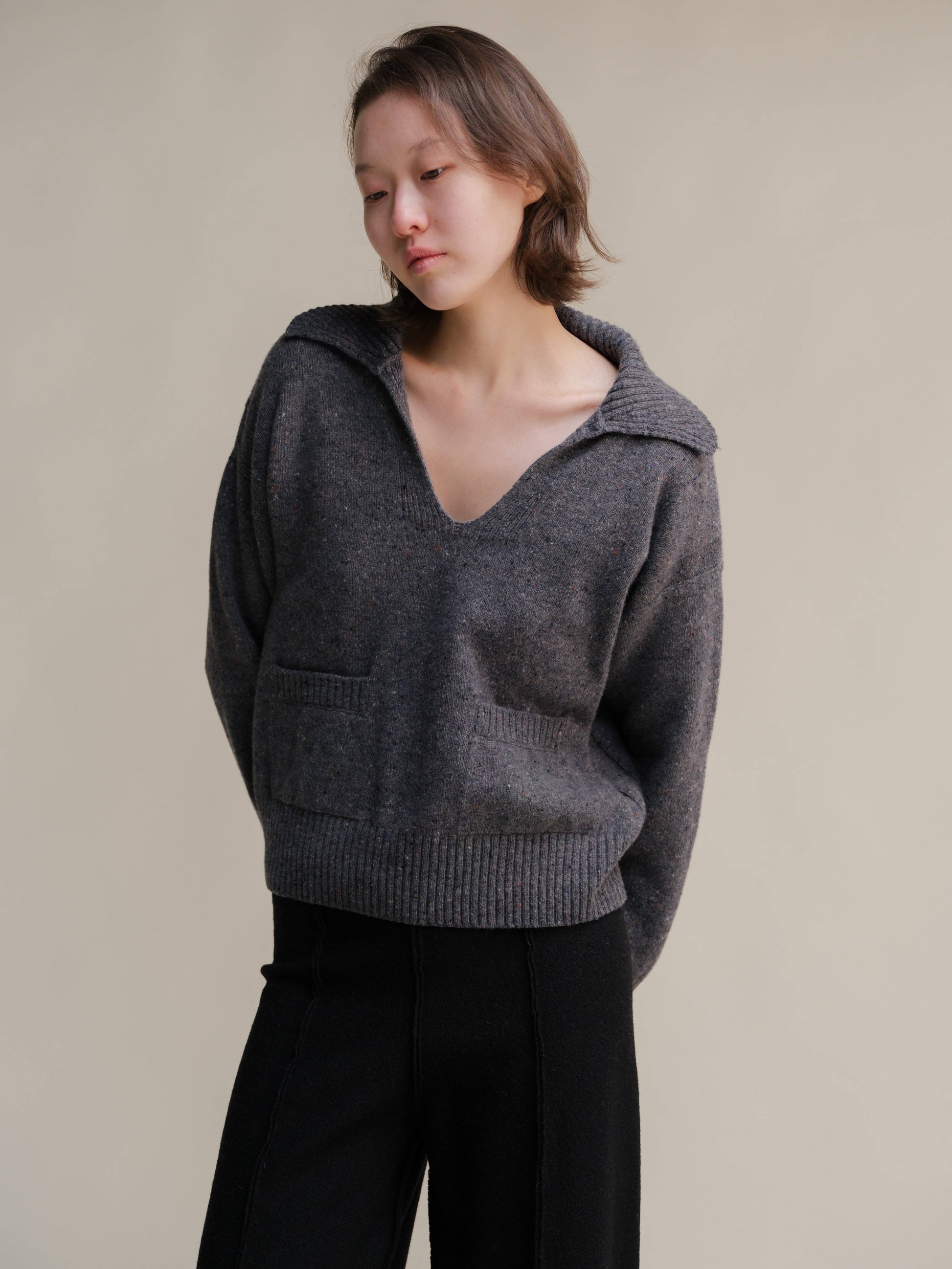 Polo oversize in tweed con tasche
