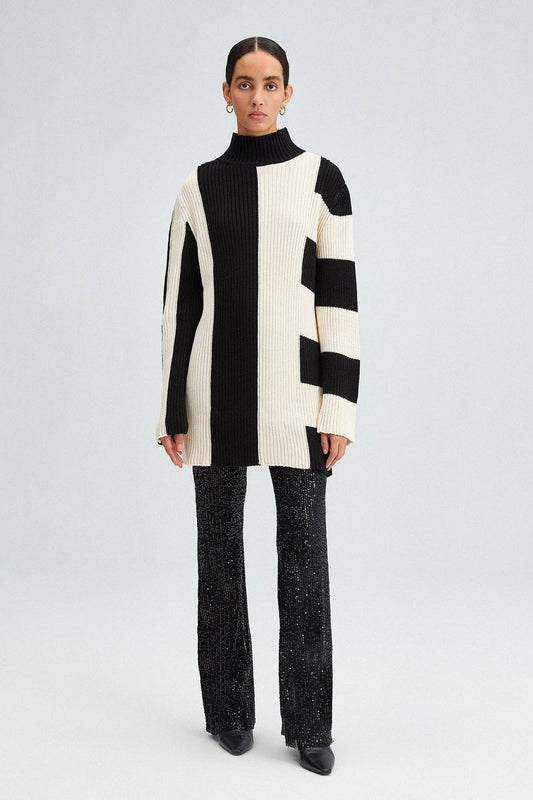 Maglione lungo a righe asimmetriche bicolore