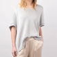 Maglione corto in maglia metallizzata con maniche corte
