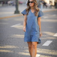 Abito corto in denim con volant