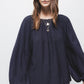Blusa in tessuto effetto stropicciato con maniche a palloncino
