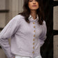 Cardigan corto in maglia con bottoni dorati