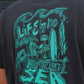 T-shirt unisex pigmentata grigio magnet con maxi stampa “Life by the Sea”