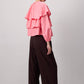 Blusa corta rosa con balze e maniche a sbuffo in misto cotone