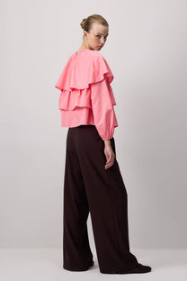 Blusa corta rosa con balze e maniche a sbuffo in misto cotone