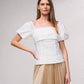 Blusa con scollo quadrato e maniche a sbuffo