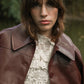 Giacca Claudiane in similpelle color vino
