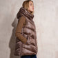 Gilet imbottito lungo con cappuccio da donna