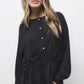 Blusa nera con coulisse in vita