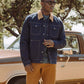 Giacca trucker in denim scuro con colletto a contrasto
