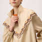 Giacca impermeabile ricamata beige