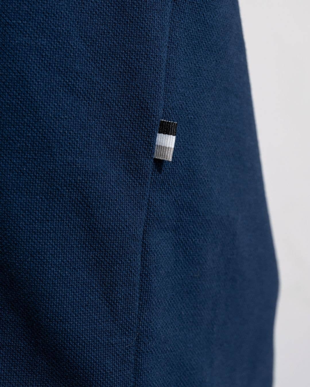 Polo uomo antimacchia bicolor in piqué