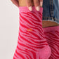 Calzini glitterati zebrati in cotone pettinato rosa e rosso