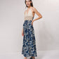 Abito lungo boho con top all’uncinetto e gonna floreale