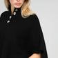 Poncho maglia nero a collo alto con bottoni