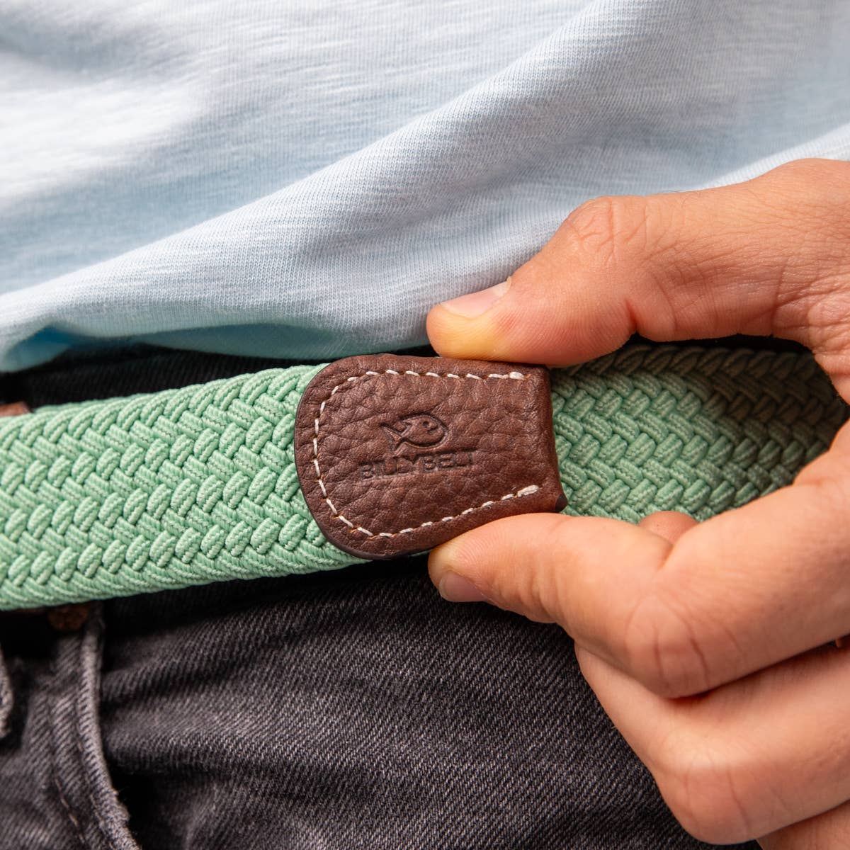 Cintura elastica intrecciata verde acqua con dettagli in pelle