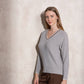 Maglione in maglia di lurex con scollo a V