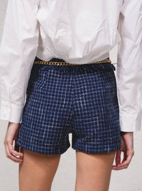 Shorts effetto tweed con catena