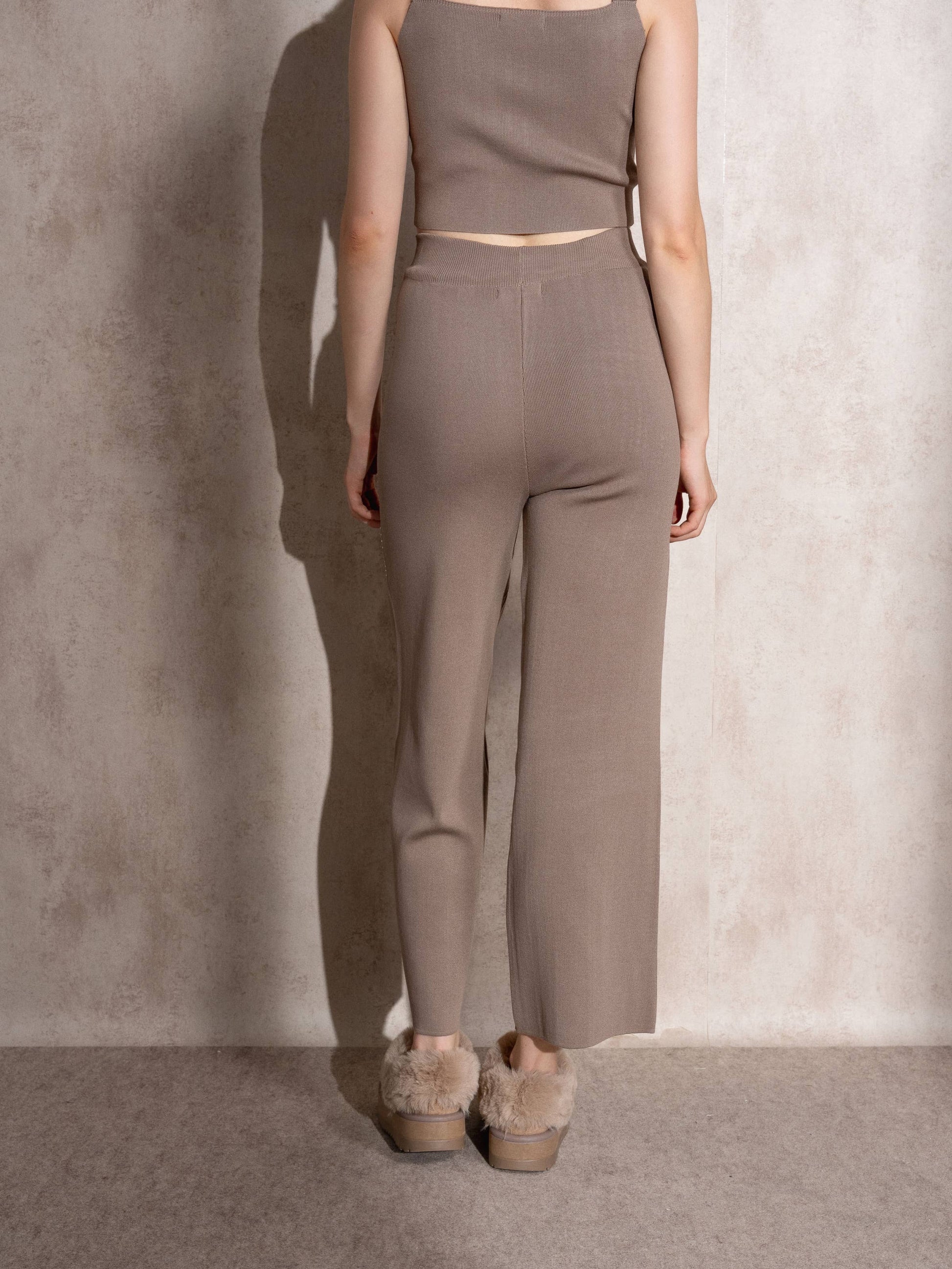 Pantaloni a vita alta in maglia con glitter