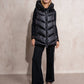 Gilet imbottito lungo con cappuccio da donna