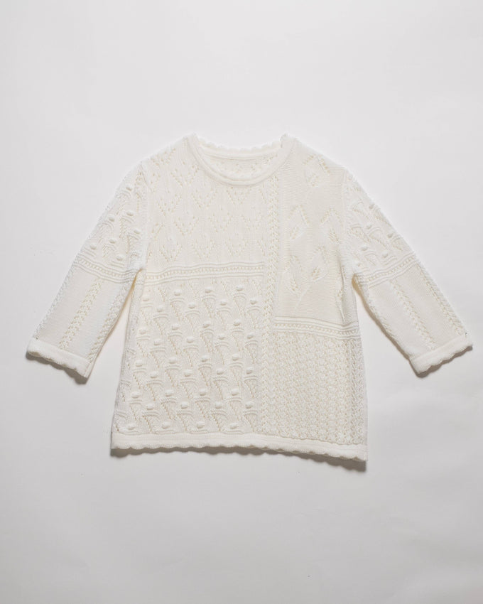 Maglia traforata in cotone con motivo floreale