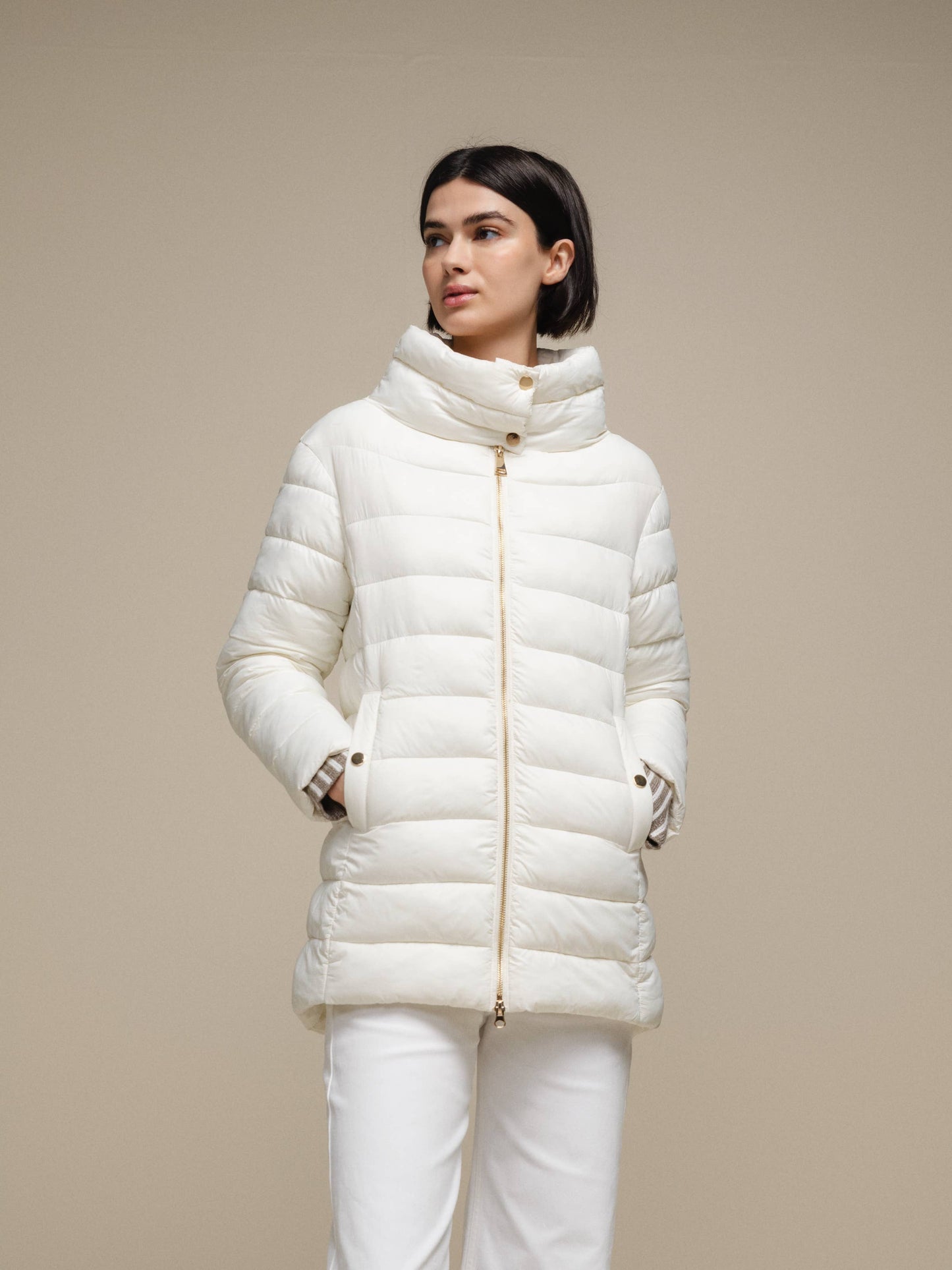 Piumino donna imbottito con collo alto