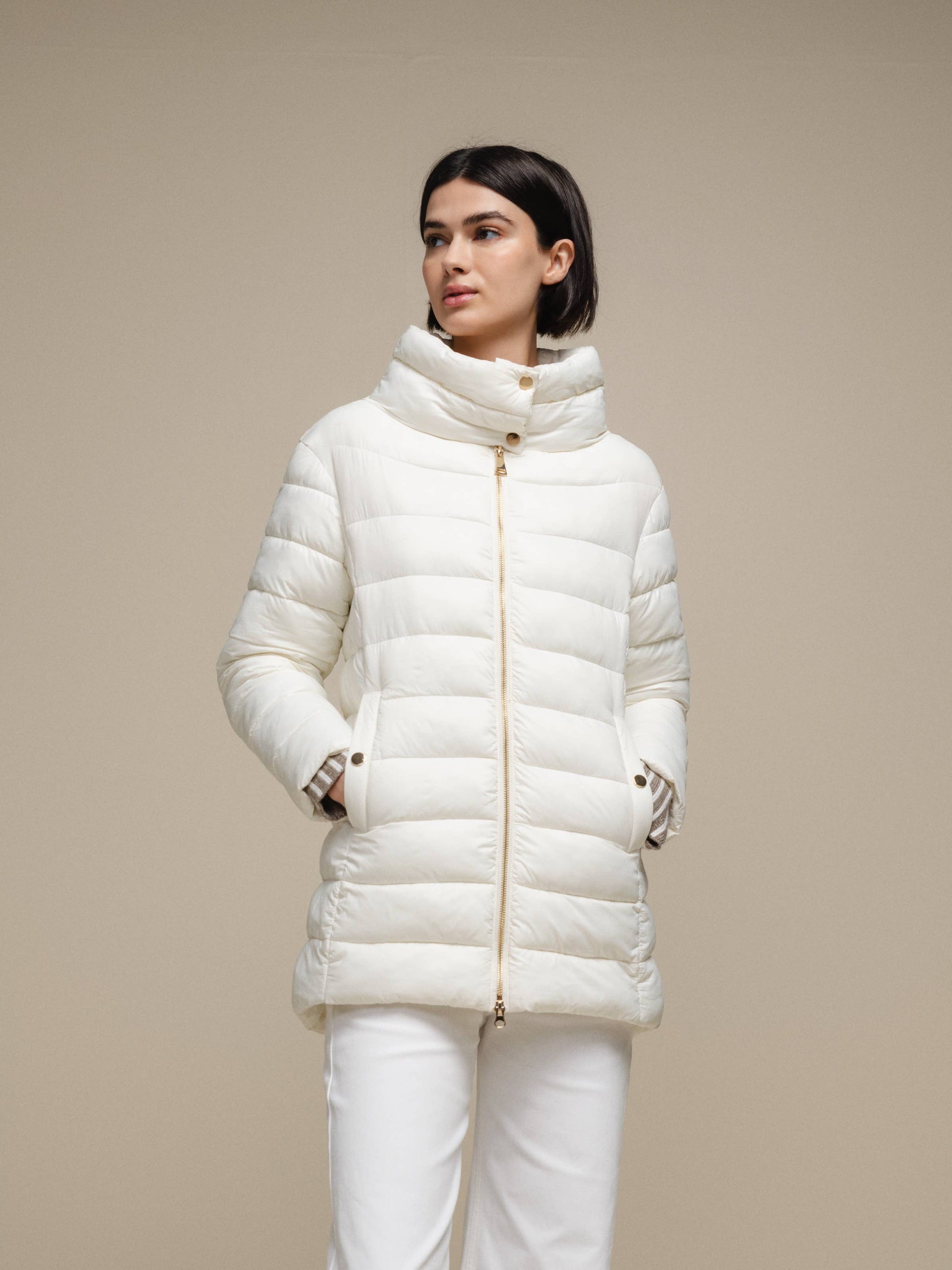 Piumino donna imbottito con collo alto
