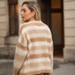 Maglione a righe con scollo a V