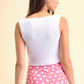 Top in maglia a costine in cotone con bottoni gioiello