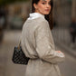 Cappotto in maglia mélange con cintura