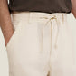 Pantaloni in lino a gamba dritta color crema