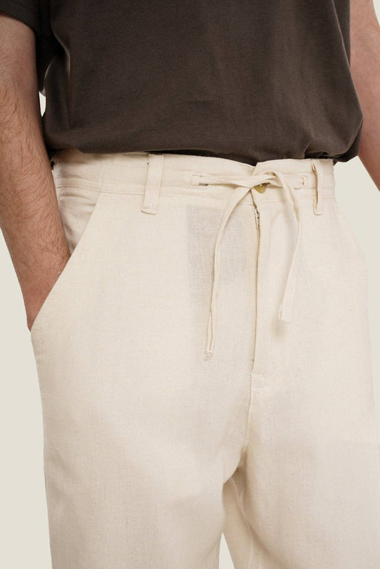 Pantaloni in lino a gamba dritta color crema