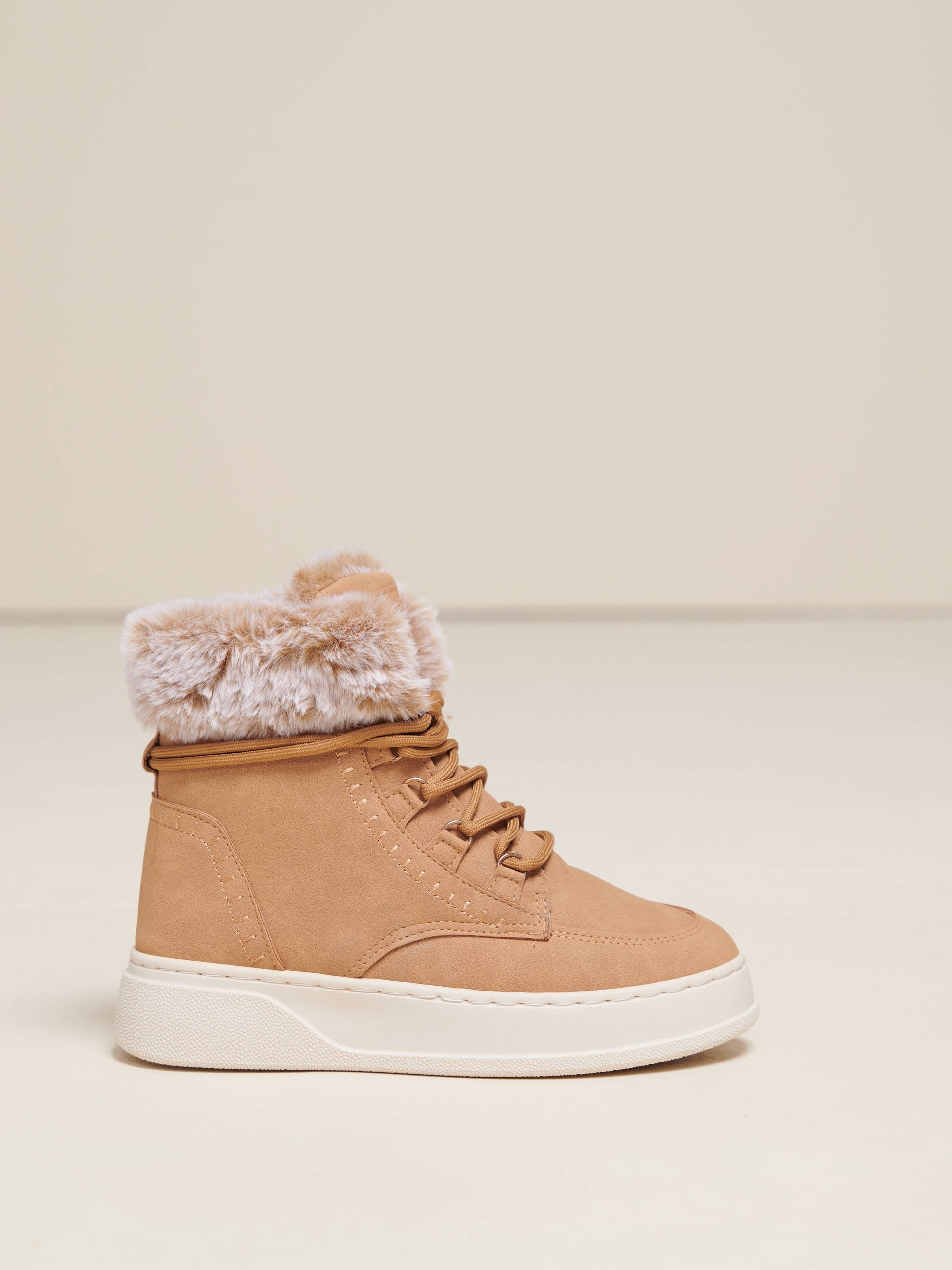 Stivali in eco-pelle con bordo in pelliccia