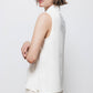 Top minimal con collo alto e fiocco